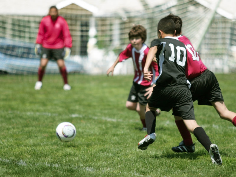 boys playing soccer